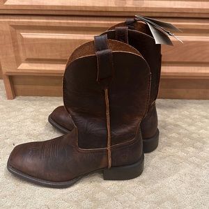 Brand new Ariat boots, never worn, no tears, no flaws at all.